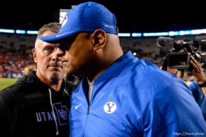 (Trent Nelson  |  The Salt Lake Tribune)   Coaches Kyle Whittingham and Kalani Sitake shake hands after the game as Brigham Young University (BYU) hosts the University of Utah, NCAA football in Provo on Friday Aug. 30, 2019.