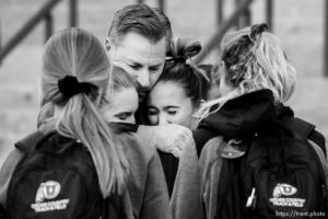(Trent Nelson  |  The Salt Lake Tribune)
Chris Vogel, who coached Lauren McCluskey before she came to Utah, embraces attendees during a vigil for McCluskey at the University of Utah in Salt Lake City on Tuesday Oct. 22, 2019.