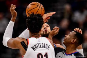 (Trent Nelson  |  The Salt Lake Tribune) Utah Jazz center Rudy Gobert (27) and Portland Trail Blazers center Hassan Whiteside (21) as the Utah Jazz host the Portland Trail Blazers, NBA basketball in Salt Lake City on Thursday, Dec. 26, 2019.