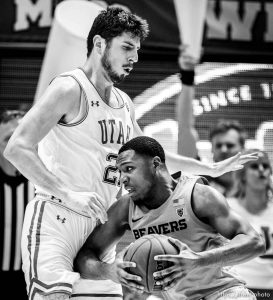 (Trent Nelson  |  The Salt Lake Tribune) Oregon State Beavers forward Alfred Hollins (4) runs into Utah Utes forward Riley Battin (21) as the University of Utah hosts Oregon State, NCAA men's basketball in Salt Lake City on Thursday, Jan. 2, 2020.
