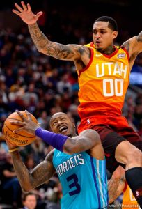 (Trent Nelson  |  The Salt Lake Tribune) Utah Jazz guard Jordan Clarkson (00) defending Charlotte Hornets guard Terry Rozier (3) as the Utah Jazz host the Charlotte Hornets, NBA basketball in Salt Lake City on Friday, Jan. 10, 2020.
