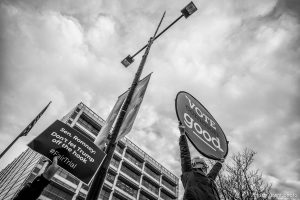 (Trent Nelson  |  The Salt Lake Tribune) Samir Selmanovic holds a sign as a coalition of progressive groups gathered Thursday outside the federal building in Salt Lake City on Thursday, Jan. 16, 2020 to push for a fair and impartial Senate impeachment hearing against President Donald Trump.