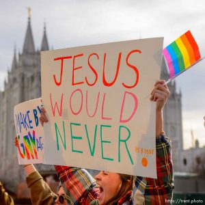 (Trent Nelson  |  The Salt Lake Tribune) Demonstrators at a rally about BYU's changing position on “romantic behavior” by same-sex couples march around the headquarters of The Church of Jesus Christ of Latter-day Saints in Salt Lake City on Friday, March 6, 2020.