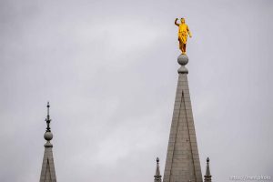 (Trent Nelson  |  The Salt Lake Tribune) The statue of Moroni atop the Salt Lake temple, damaged in an earthquake in Salt Lake City on Wednesday, March 18, 2020.