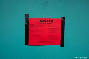 (Trent Nelson  |  The Salt Lake Tribune) A warning notice at the Empress Theatre in Magna on Tuesday, March 24, 2020. Empress Theatre