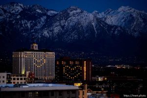 (Trent Nelson  |  The Salt Lake Tribune) Lights in the Grand America and Little America hotels display hearts in Salt Lake City on Wednesday, April 8, 2020.