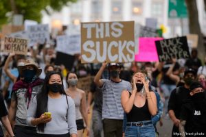 (Trent Nelson  |  The Salt Lake Tribune) Protesters march against police brutality rally down State Street in Salt Lake City on Friday, June 5, 2020.