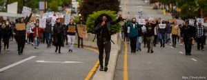 (Trent Nelson  |  The Salt Lake Tribune) Protesters march against police brutality in Salt Lake City on Sunday, June 7, 2020.