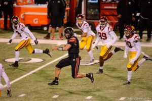 (Trent Nelson  |  The Salt Lake Tribune) Utah Utes quarterback Jake Bentley (8) runs the ball as the Utah Utes host the USC Trojans, NCAA football at Rice-Eccles Stadium in Salt Lake City on Saturday, Nov. 21, 2020.