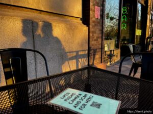 (Trent Nelson  |  The Salt Lake Tribune) A menu is available via QR code from an outdoor table at Alibi Bar & Place in Salt Lake City on Wednesday, Nov. 25, 2020.