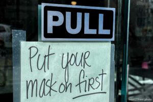 (Trent Nelson | The Salt Lake Tribune) A sign requiring masks for entrance at Itto Sushi in Salt Lake City on Tuesday, Nov. 17, 2020.