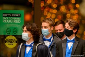 (Trent Nelson  |  The Salt Lake Tribune) Masks are a common sight in Salt Lake City on Friday, Dec. 11, 2020. The Utah Department of Health on Friday reported a seven-day average of 2,702 new positive test results per day — below last week’s rate of nearly 3,000.