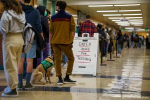 (Trent Nelson  |  The Salt Lake Tribune) Students line up for COVID-19 tests as they return to Highland High School in Salt Lake City on Monday, Feb. 8, 2021.