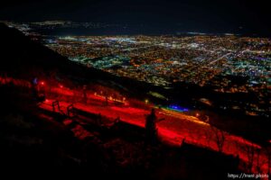 (Trent Nelson  |  The Salt Lake Tribune) A group of people, including many BYU students, shine Pride colors on the Y on the mountain above BYU in Provo on Thursday, March 4, 2021.