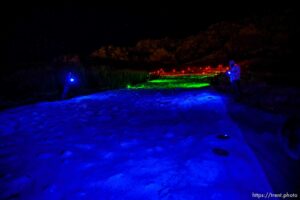 (Trent Nelson  |  The Salt Lake Tribune) A group of people, including many BYU students, shine Pride colors on the Y on the mountain above BYU in Provo on Thursday, March 4, 2021.