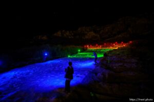 (Trent Nelson  |  The Salt Lake Tribune) A group of people, including many BYU students, shine Pride colors on the Y on the mountain above BYU in Provo on Thursday, March 4, 2021.