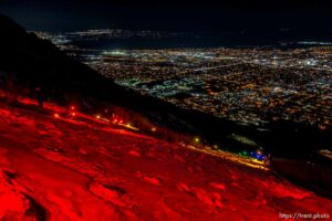 (Trent Nelson  |  The Salt Lake Tribune) A group of people, including many BYU students, shine Pride colors on the Y on the mountain above BYU in Provo on Thursday, March 4, 2021.