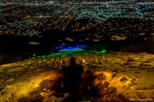 (Trent Nelson  |  The Salt Lake Tribune) A group of people, including many BYU students, shine Pride colors on the Y on the mountain above BYU in Provo on Thursday, March 4, 2021.