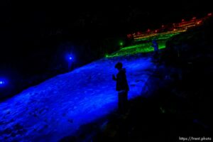 (Trent Nelson  |  The Salt Lake Tribune) A group of people, including many BYU students, shine Pride colors on the Y on the mountain above BYU in Provo on Thursday, March 4, 2021.