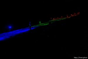 (Trent Nelson  |  The Salt Lake Tribune) A group of people, including many BYU students, shine Pride colors on the Y on the mountain above BYU in Provo on Thursday, March 4, 2021.