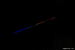 (Trent Nelson  |  The Salt Lake Tribune) A group of people, including many BYU students, shine Pride colors on the Y on the mountain above BYU in Provo on Thursday, March 4, 2021.