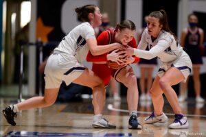 (Trent Nelson  |  The Salt Lake Tribune) Lehi vs Sproingville, high school basketball semifinals, in Taylorsville on Friday, March 5, 2021. Maddie Warren, Kayla Porray, Jamisyn Heaton