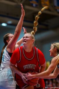 (Trent Nelson  |  The Salt Lake Tribune) as Springville faces Farmington High School in the 5A girls basketball state championship game, in Taylorsville on Saturday, March 6, 2021.  Addisyn Johnson defended by Delaney Baker