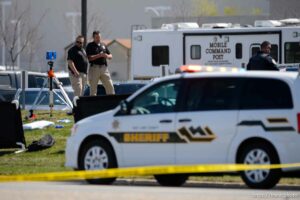 (Trent Nelson  |  The Salt Lake Tribune) Police on the scene of a shooting at the Salt Lake County Sheriff's Office in South Salt Lake on Saturday, April 10, 2021.