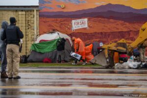 (Trent Nelson  |  The Salt Lake Tribune) Salt Lake County conducts a camp cleanup at the Fleet Block Murals  in Salt Lake City on Wednesday, April 14, 2021.