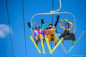 (Trent Nelson  |  The Salt Lake Tribune) Skiers dance to music from their boom box on the lift at Solitude on Saturday, April 17, 2021.