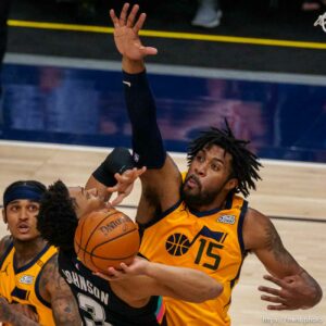 (Trent Nelson  |  The Salt Lake Tribune) San Antonio Spurs forward Keldon Johnson (3) Utah Jazz center Derrick Favors (15) as the Utah Jazz host the San Antonio Spurs, NBA basketball in Salt Lake City on Monday, May 3, 2021.
