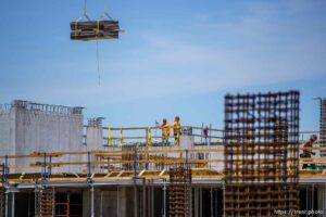(Trent Nelson  |  The Salt Lake Tribune) Workers at the Post District development in Salt Lake City on Wednesday, May 12, 2021.