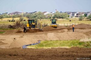(Trent Nelson  |  The Salt Lake Tribune) Heavy equipment works on the West Davis Highway project in Layton on Tuesday, May 25, 2021.
