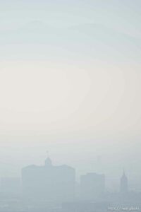 (Trent Nelson  |  The Salt Lake Tribune) Poor air quality obscures the Oquirrh Mountains and downtown Salt Lake City, as seen from the University of Utah on Friday, Dec. 3, 2021.