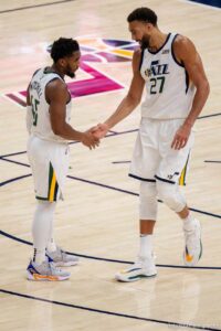 (Trent Nelson  |  The Salt Lake Tribune) Utah Jazz guard Donovan Mitchell (45) and Utah Jazz center Rudy Gobert (27) as the Utah Jazz host the Charlotte Hornets, NBA basketball in Salt Lake City on Monday, Dec. 20, 2021.