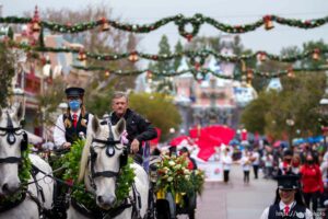 (Trent Nelson  |  The Salt Lake Tribune) Utah football coach Kyle Whittingham rides down Disneyland's Main Street in the Rose Bowl Game Cavalcade in Anaheim on Monday, Dec. 27, 2021.