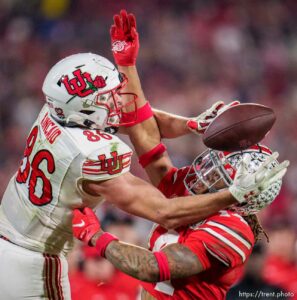 (Trent Nelson  |  The Salt Lake Tribune) Ohio State Buckeyes safety Ronnie Hickman (14) interferes with the pass to Utah Utes tight end Dalton Kincaid (86) as the Utah Utes face the Ohio State Buckeyes at the Rose Bowl in Pasadena, Calif., on Saturday, Jan. 1, 2022.