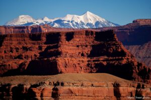 snow-covered la sal mountains la sals peaking out over red rock, from chicken corners, on Saturday, Jan. 15, 2022.