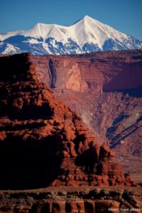 snow-covered la sal mountains la sals peaking out over red rock, from chicken corners, on Saturday, Jan. 15, 2022.