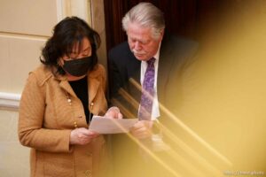 (Trent Nelson  |  The Salt Lake Tribune) Sen. Jani Iwamoto, D-Holladay, Sen. Gene Davis, D-Salt Lake City, in the Senate Chamber on the last day of the legislative session, in Salt Lake City on Friday, March 4, 2022.