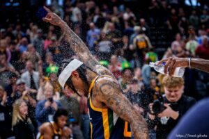 (Trent Nelson  |  The Salt Lake Tribune) Utah Jazz guard Jordan Clarkson (00) is splashed with water by teammates as the Utah Jazz host the Sacramento Kings, NBA basketball in Salt Lake City on Saturday, March 12, 2022. Clarkson finished with a career-high 45 points.