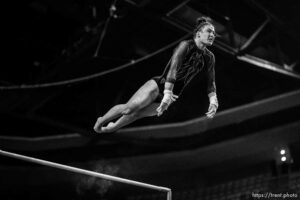 (Trent Nelson  |  The Salt Lake Tribune) Sage Thompson on bars at the Pac-12 gymnastics championships at the Maverik Center in West Valley City on Saturday, March 19, 2022.