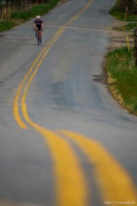 (Trent Nelson  |  The Salt Lake Tribune) Triathlete Kyle Brown rides in Farmington on Tuesday, April 26, 2022.