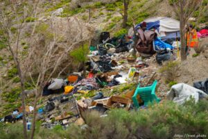 (Trent Nelson  |  The Salt Lake Tribune) The clearing of camps located east of Victory Road in the foothills north of Salt Lake City on Wednesday, April 27, 2022.