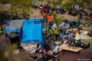 (Trent Nelson  |  The Salt Lake Tribune) The clearing of camps located east of Victory Road in the foothills north of Salt Lake City on Wednesday, April 27, 2022.