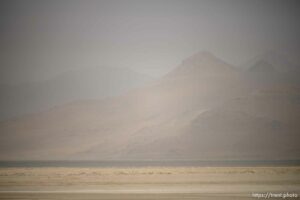 (Trent Nelson  |  The Salt Lake Tribune) Dust obscures Antelope Island and the Great Salt Lake on Saturday, June 18, 2022.