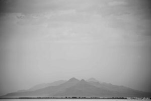 (Trent Nelson  |  The Salt Lake Tribune) Dust obscures Antelope Island and the Great Salt Lake on Saturday, June 18, 2022.