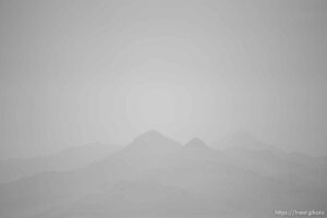 (Trent Nelson  |  The Salt Lake Tribune) Dust obscures Antelope Island and the Great Salt Lake on Saturday, June 18, 2022.