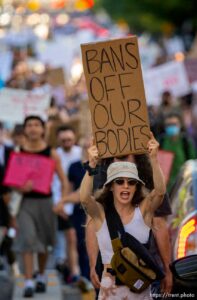 (Trent Nelson  |  The Salt Lake Tribune) People march up State Street at a protest in Salt Lake City after the U.S. Supreme Court overruled Roe v. Wade, on Friday, June 24, 2022.