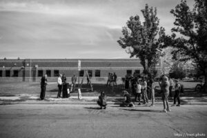 (Trent Nelson  |  The Salt Lake Tribune) Mayor Erin Mendenhall prepares to swap out a 25 mph speed limit sign for a new 20 mph sign, in Salt Lake City on Wednesday, July 27, 2022.
